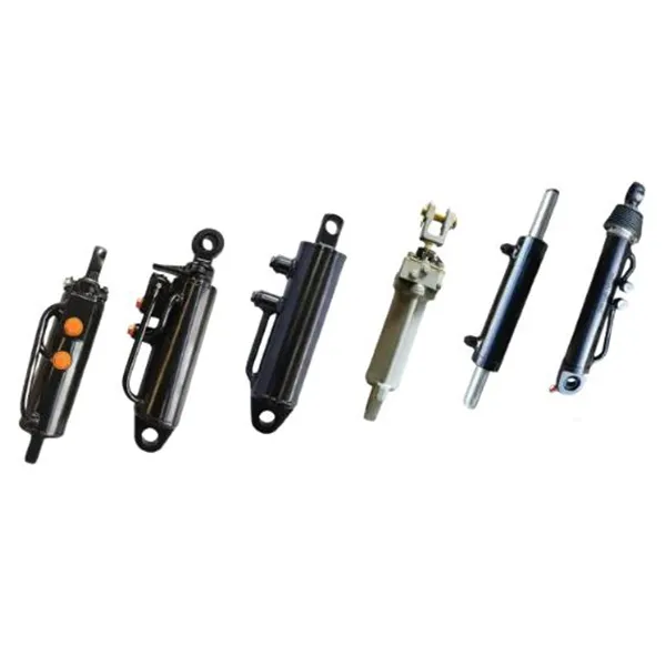 Гідравлічні циліндри рульового керування та заднього підйому трактора